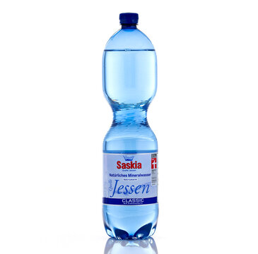 Saskia Jessen Classic sparkling mineral water bottle isolated on light background. Illustrative editorial studio product photography of bottled water packaging.
