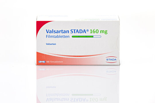 Valsartan STADA 160 mg film tablets medication box isolated on light background. Illustrative editorial studio product photography for healthcare and pharmaceutical concepts.

