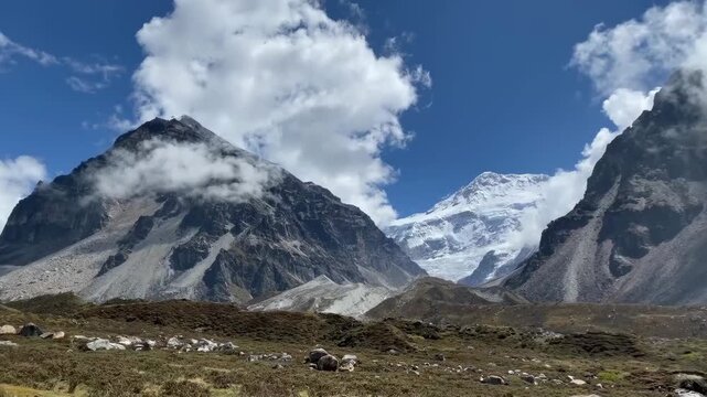 Panoramic view of Kangchenjunga North Base Camp valley showcasing dramatic Himalayan peaks, glacier landscapes, rugged wilderness, trekking adventure, and pristine mountain scenery.