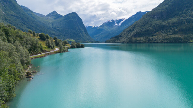 Turquoise Oldevatnet Lake Surrounded by Mountains in Olden Norway