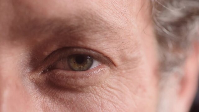 Eye care, face and vision with mature person for optometry, eyesight wellness and glaucoma exam. Closeup, ophthalmology and ocular health with iris, contact lenses or portrait with optical assessment