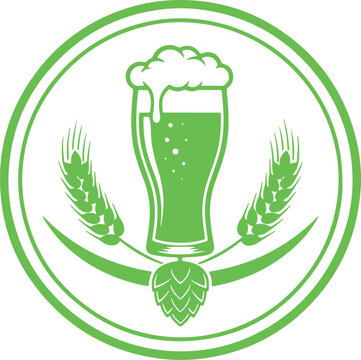 Green beer glass with foam and wheat stalks and hop cone in circle on grey checkered background.