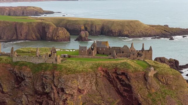 Dunnottar castle ruins perched on a cliff over the north sea in scotland