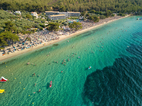 Crowded Sandy Shore of Paralia Pachi Beach, Thasos, Greece