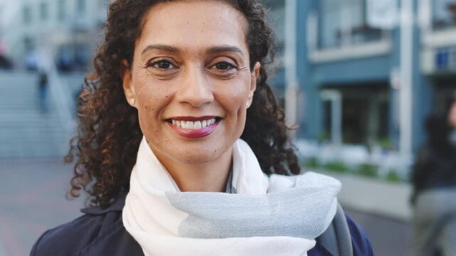 City, commute and face of business woman on sidewalk for career opportunity or development. Buildings, job satisfaction and travel with mature employee outdoor in urban town for work professionalism