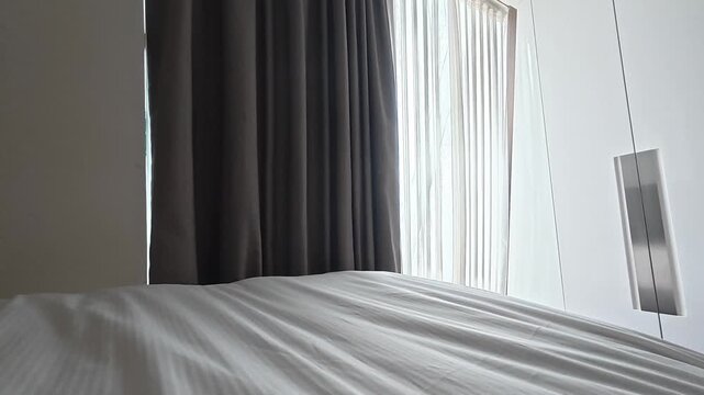 Automatic curtains in the bedroom, sunlight. Curtains bed ceiling. High quality 4k footage