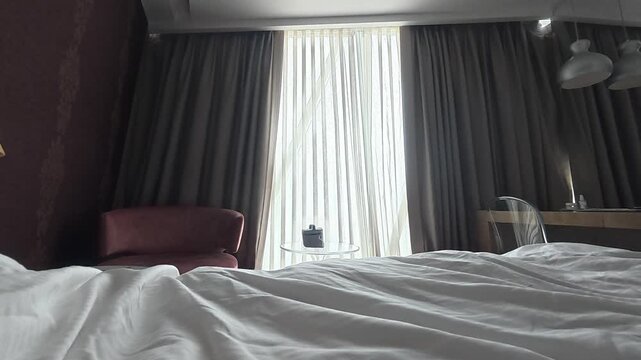 Automatic curtains in the bedroom, sunlight. Curtains bed ceiling. High quality 4k footage
