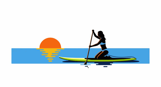 Woman paddleboarding at sunset