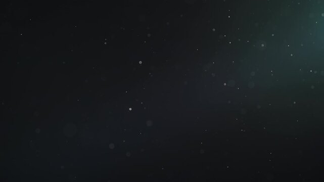 Slow motion real dust particles floating mid air over dark background