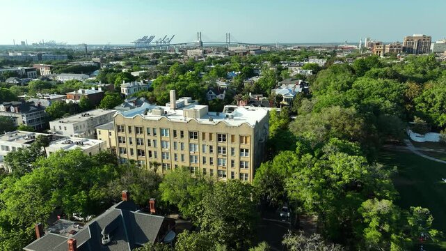 Aerial shot of a historic building on the corner of Forsyth Park in Savannah, Georgia.