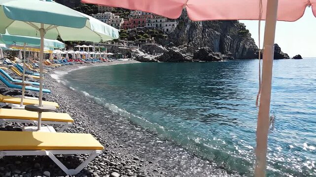 Veo 3.1 Fast Generate 001 21. Amalfi Style Beach With Pastel Umbrell