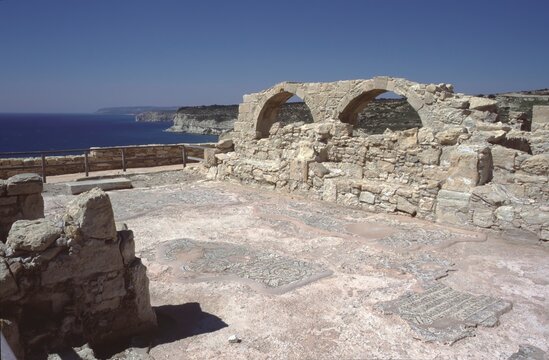 Kourion Archaeological Site ruins with partial mosaic flooring overlooking the coast and sea