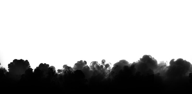 Dark black smoke swirls elegantly across the bottom edge of the frame creating a dramatic and mysterious artistic texture that is isolated against a clean and bright white background area.