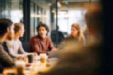 Fototapeta premium Blurred Team collaborating in modern office meeting