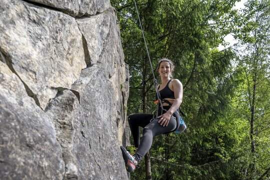 Climber rock climbing, woman climbing in toprope, sport climbing, climbing garden Bad Heilbrunn, Bavaria, Germany
