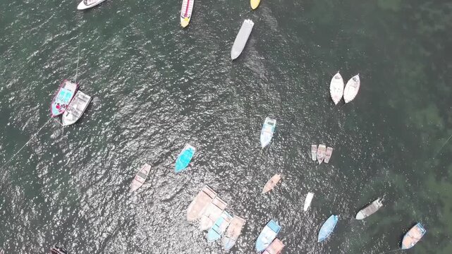 Aerial view of Paracas Bay with tourist boats and pier, Ica, Peru.