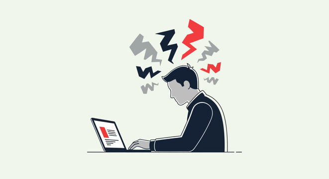 Frustrated man using a laptop computer.