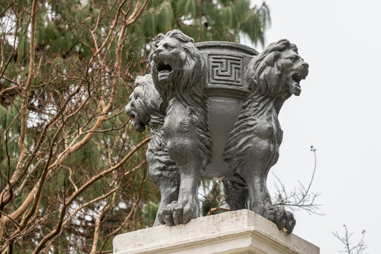 Antique cast-iron flower pots in the Arboretum park in Sochi. A monument of landscape art. Collection of subtropical flora and fauna. Park architecture and sculpture of the 19th century.