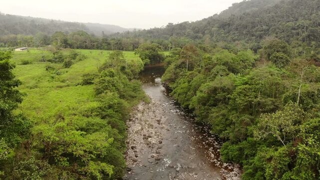 Aerial view of Rio Achiote, near Puerto Quito, Ecuador. Running through a largely human altered landscape which was formerly lowland rainforest in the biodiverse  Choco Biogeographical Region
