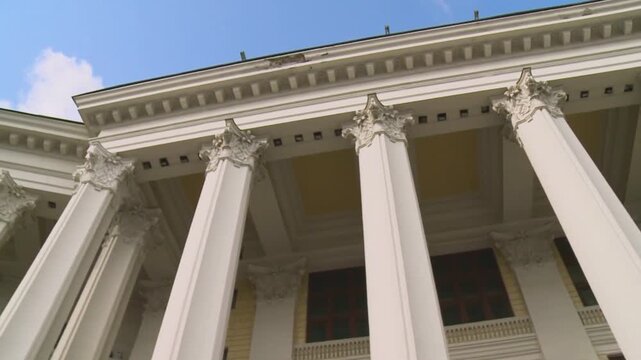 Close Up of Greek Style Columns on Historic Building Exterior
