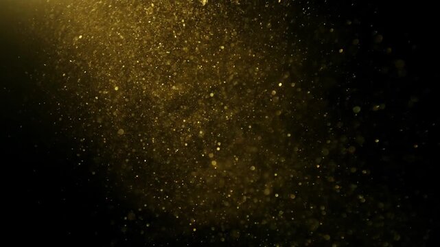 Golden Glitter Particles Floating in Slow Motion on Black