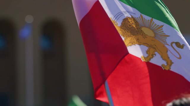 Argentinian flag waving in sunlight during patriotic outdoor celebration