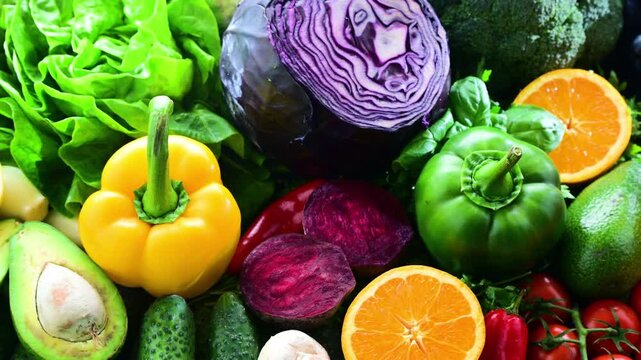 Fresh raw vegetables and fruits. Ingredients of vegan diet.