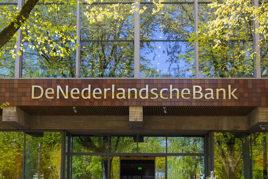 Amsterdam, Netherlands - 30 April 2026: Entrance of DNB, De Nederlandsche Bank in Amsterdam surrounded by trees and greenery.