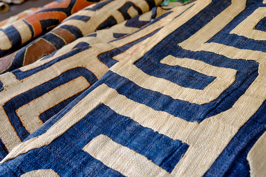 Blue and beige African  textiles at Paris flea market