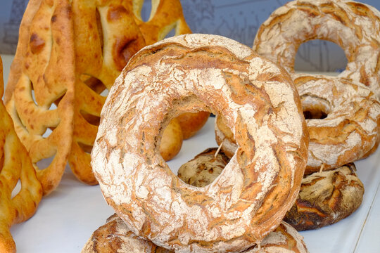 Decorative artisan breads in French bakery display