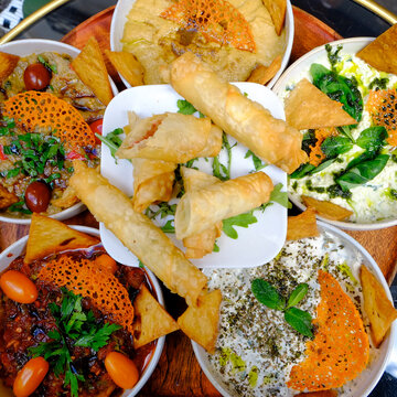 Asian food platter with fried appetizers and vegetables