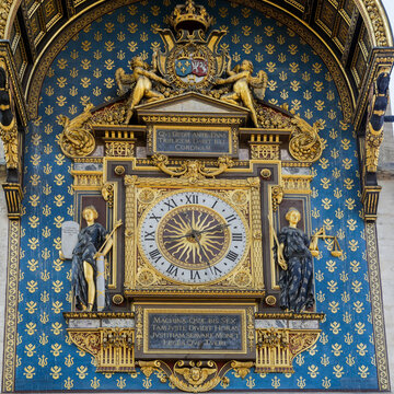 Ornate historic clock with blue and gold decoration
