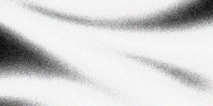Closeup macro of natural black and white fur texture featuring a cold winter frost pattern and gray textured surface for a clean seasonal wallpaper design