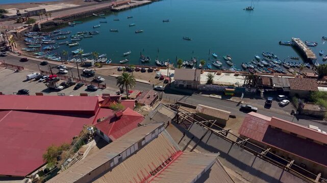 Aerial views showcase Santa Rosalia, a mining town in Baja California Sur, with boats, church, and local architecture visible.
