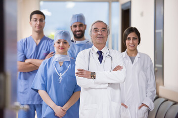Experienced ophthalmology team at modern eye hospital in Egypt standing together in clinic hallway