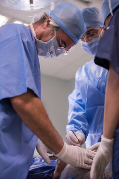 Modern Middle Eastern eye surgery team performing an operation in a small clinic in Egypt