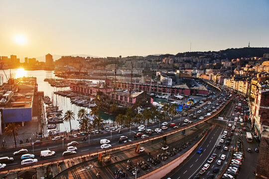 Scenic view of Porto Antico (Old Port) at sunset in Genoa, Italy, Europe 