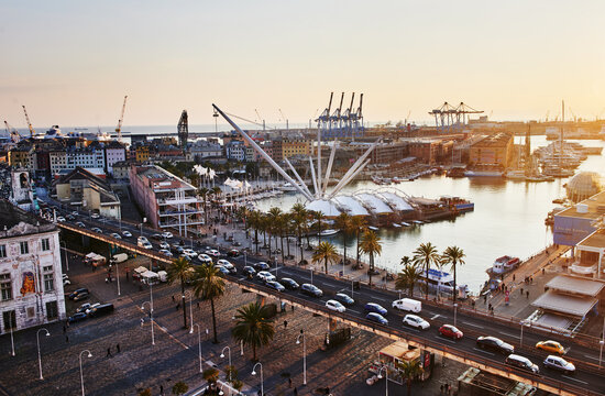 Scenic view of Porto Antico (Old Port) at sunset in Genoa, Italy, Europe 