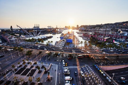 Scenic view of Porto Antico (Old Port) at sunset in Genoa, Italy, Europe 