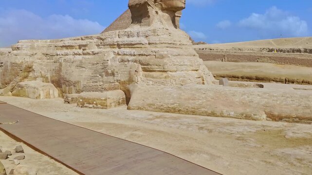 Slow motion footage showing the great sphinx of giza, a limestone statue of a reclining sphinx, a mythical creature with a human head