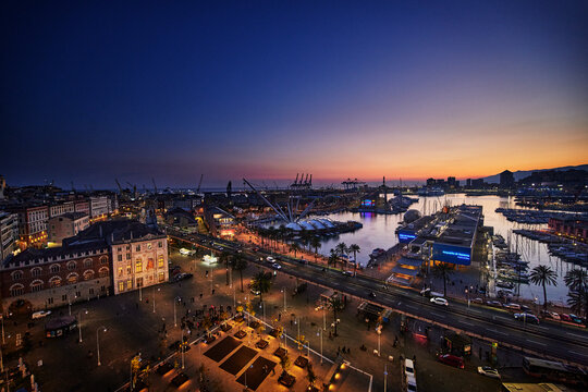 Scenic view of Porto Antico (Old Port) at dusk in Genoa, Italy, Europe 