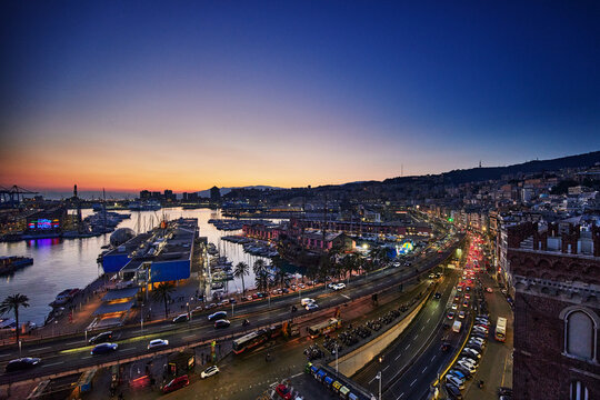 Scenic view of Porto Antico (Old Port) at dusk in Genoa, Italy, Europe 