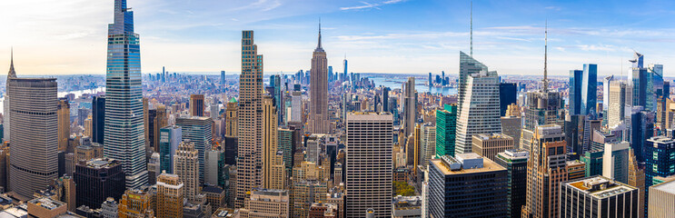 New York City skyline with Empire State Building on clear daytime view © Alexey Fedorenko