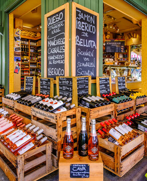 Munich, Germany - November 8: Wooden crates hold different kinds of wine bottles outside a shop in Munich on November 8, 2023