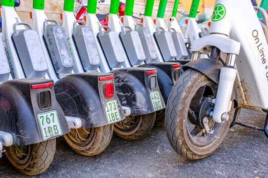 Munich, Germany - April 11: typical electro scooter at a sidewalk in munich on April 11, 2025