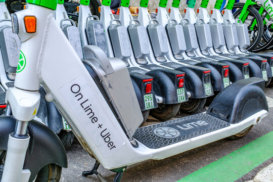 Munich, Germany - June 10: typical electro scooter at a sidewalk in munich on June 10, 2025
