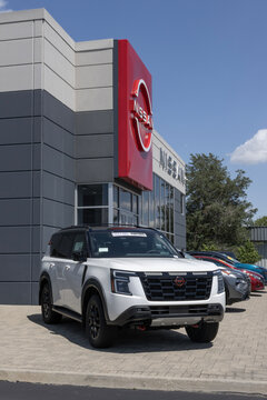 Nissan Armada Pro-4X 4WD SUV display at a dealership. Nissan offers the Armada with a 3.5L Twin-Turbo V6 engine. MY:2026