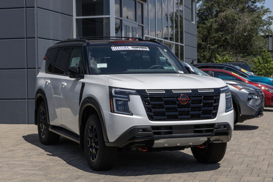 Nissan Armada Pro-4X 4WD SUV display at a dealership. Nissan offers the Armada with a 3.5L Twin-Turbo V6 engine. MY:2026