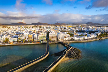 Obraz premium Aerial drone view of the beauty of Arrecife town on Lanzarote island through breathtaking aerial views showcasing the coastline, local buildings, and scenic landscape