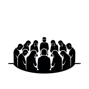 Group of people sitting in a circle heads bowed in prayer or meditation.